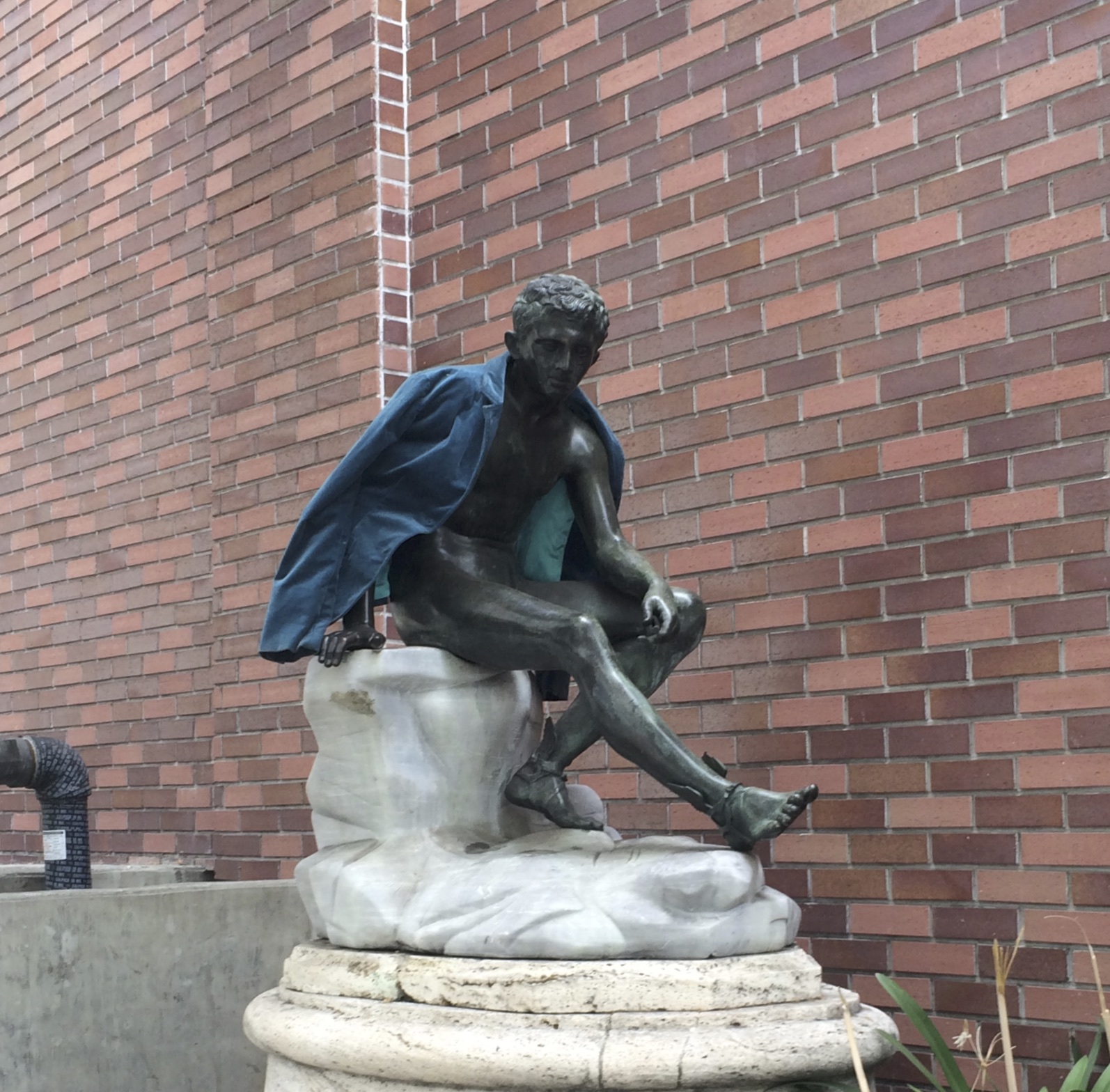 Statue Of Man With Winged Feet