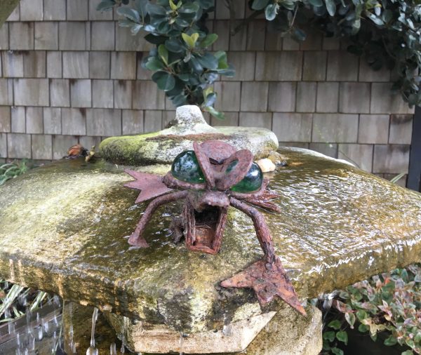 Rusty Statue Of A Frog In A Fountain