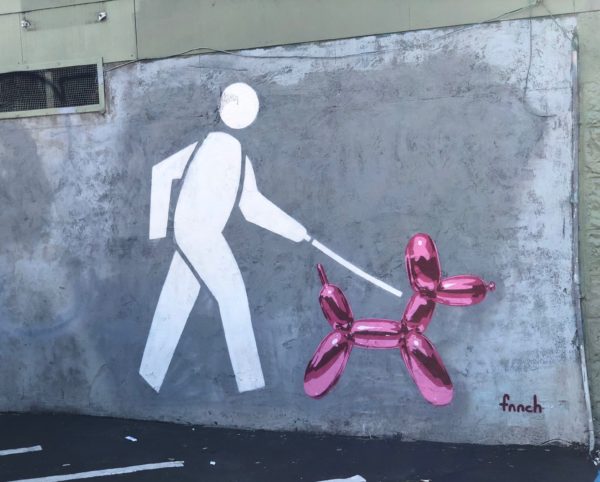 Mural Of Stick Figure Man Walking Balloon Animal
