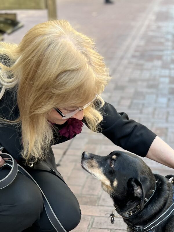 Woman Petting Dachshund Beagle Mix