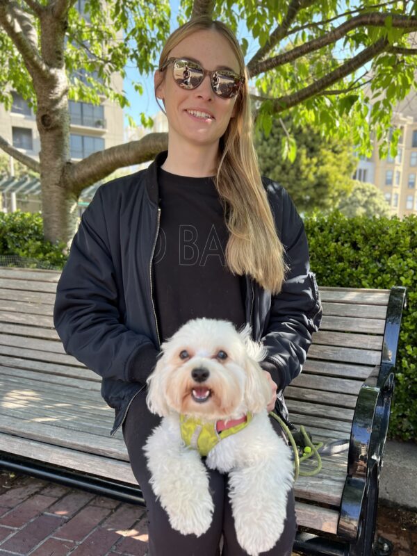 My mom and me are on an ADVENTURE! Woman With Maltie-Poo In Her Lap