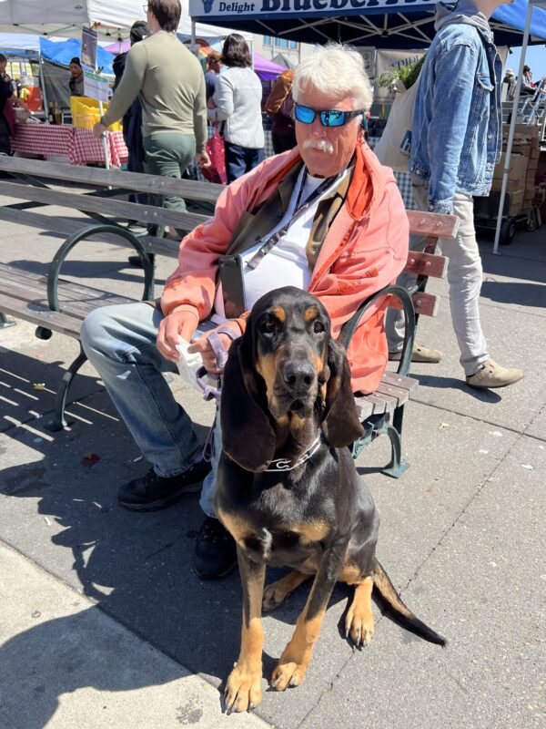 Man With Bloodhound
